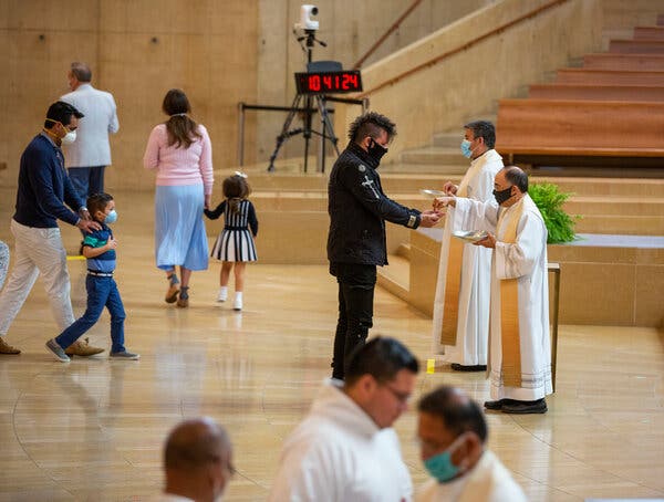 A film director, John Soares, receiving communion at the Cathedral of Our Lady of the Angels in downtown Los Angeles in June of last year.