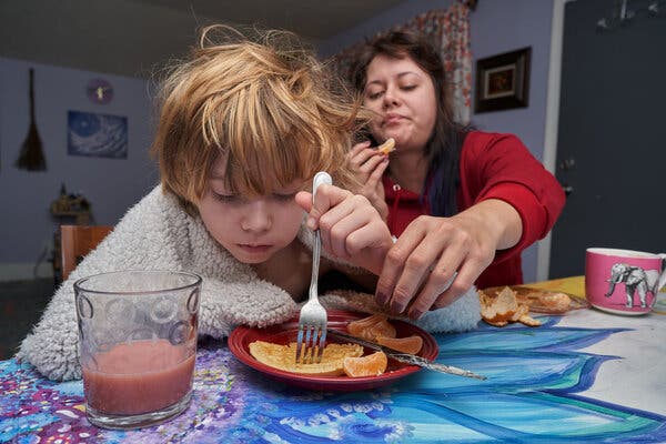 Liz Halfhill, 30, works full time as a paralegal while in school and is her son’s primary caregiver. Some mornings, the two let out guttural screams — catharsis amid the stress of the past 11 months.