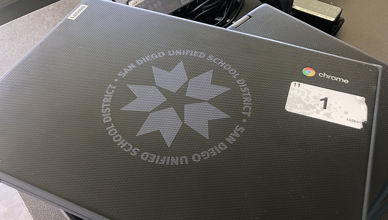 A computer provided by the San Diego Unified School District for a distance l... A computer provided by the San Diego Unified School District for a distance l...